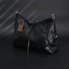 louis-vuitton-black-mahina-leather-hobo-shoulder-bag Tote
